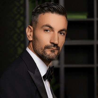 Dumitru Culiuc, founder and creative director of Image Studio, professional portrait in black tuxedo