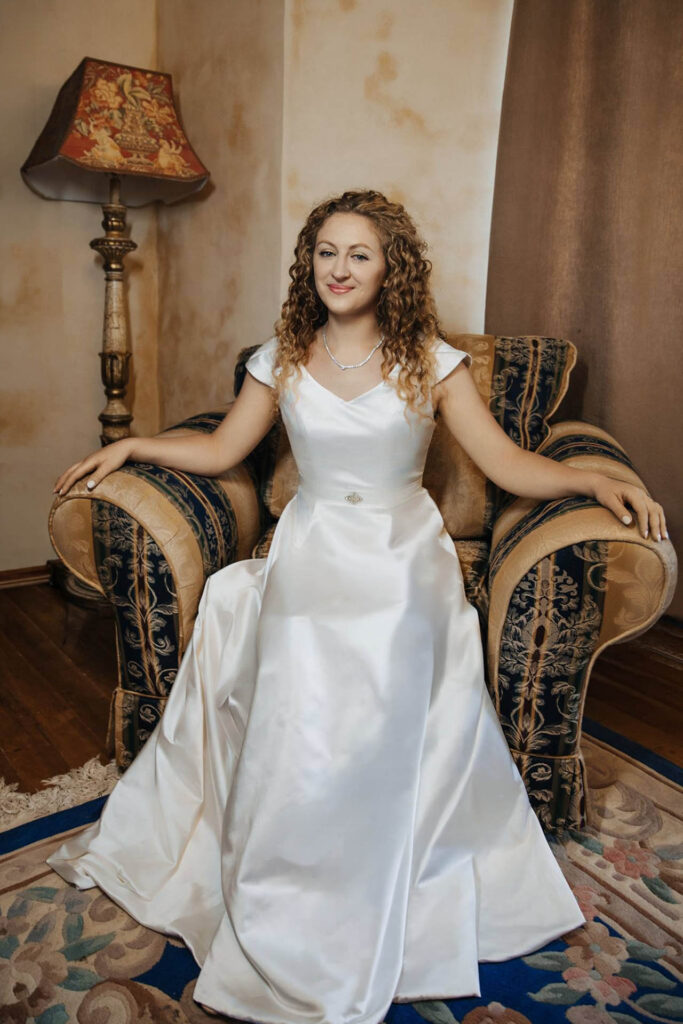 Bride portrait inside a Paris château during an elegant destination wedding in France