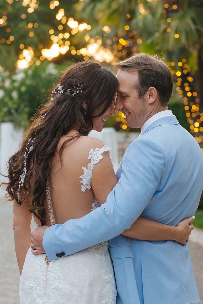 Bride and groom embracing at sunset during a wedding at La Grotte Resort in Picinisco, Italy