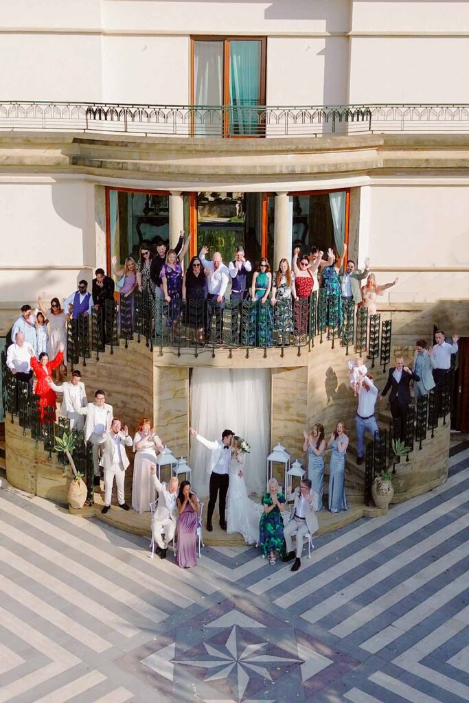 Bride and groom celebrating with guests at Villa Antiche Mura in Sorrento during a luxury Amalfi Coast destination wedding
