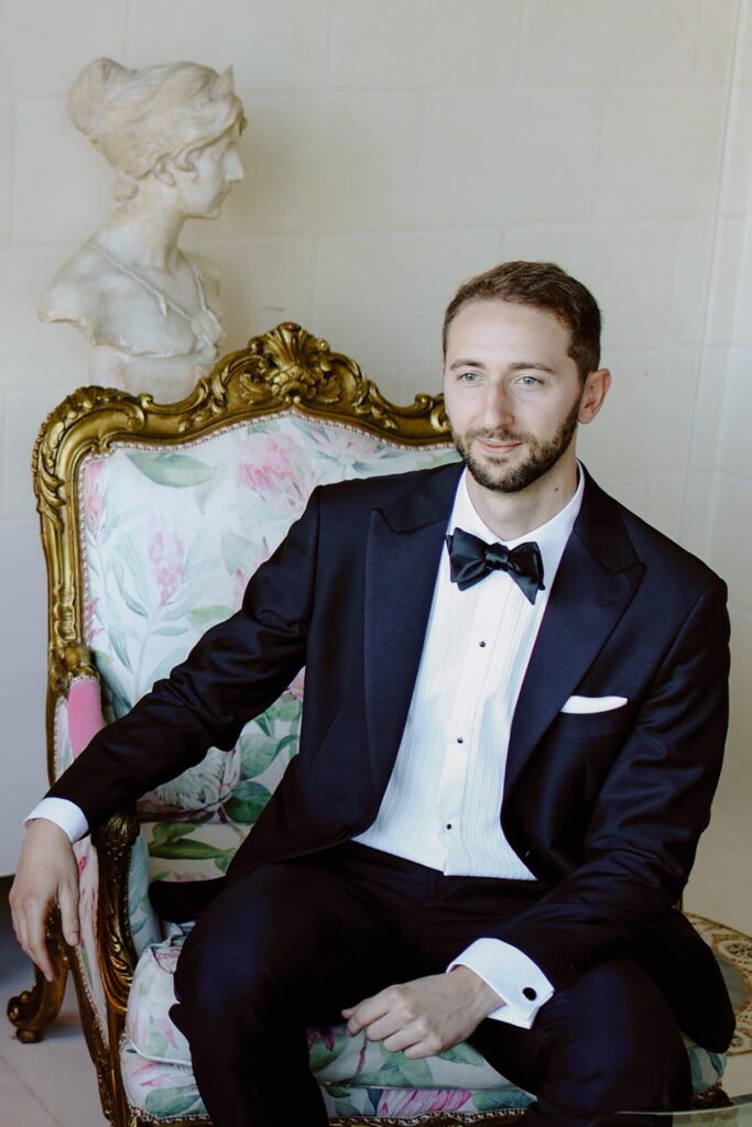 Elegant groom portrait inside Villa e Palazzo Aminta on Lake Maggiore, Italy